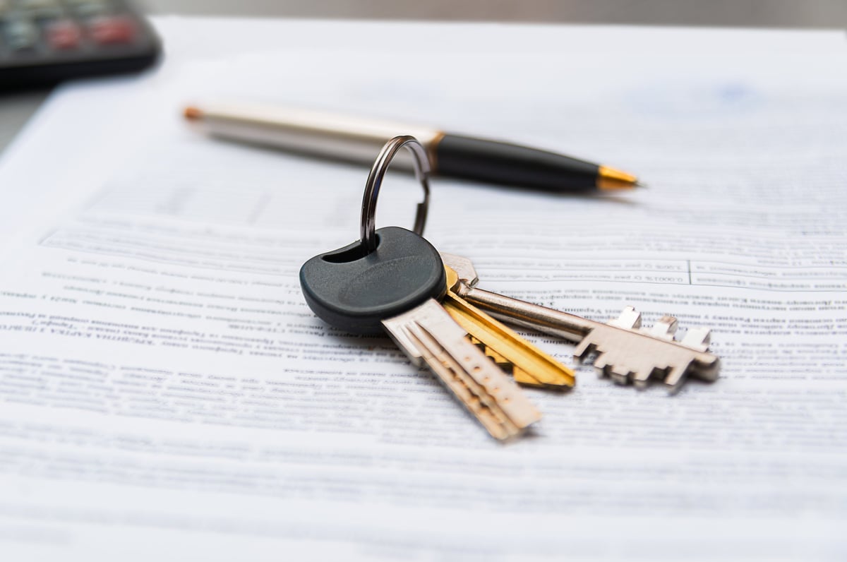 Property keys, checklist and organized service materials representing Suncoast's owner-led approach