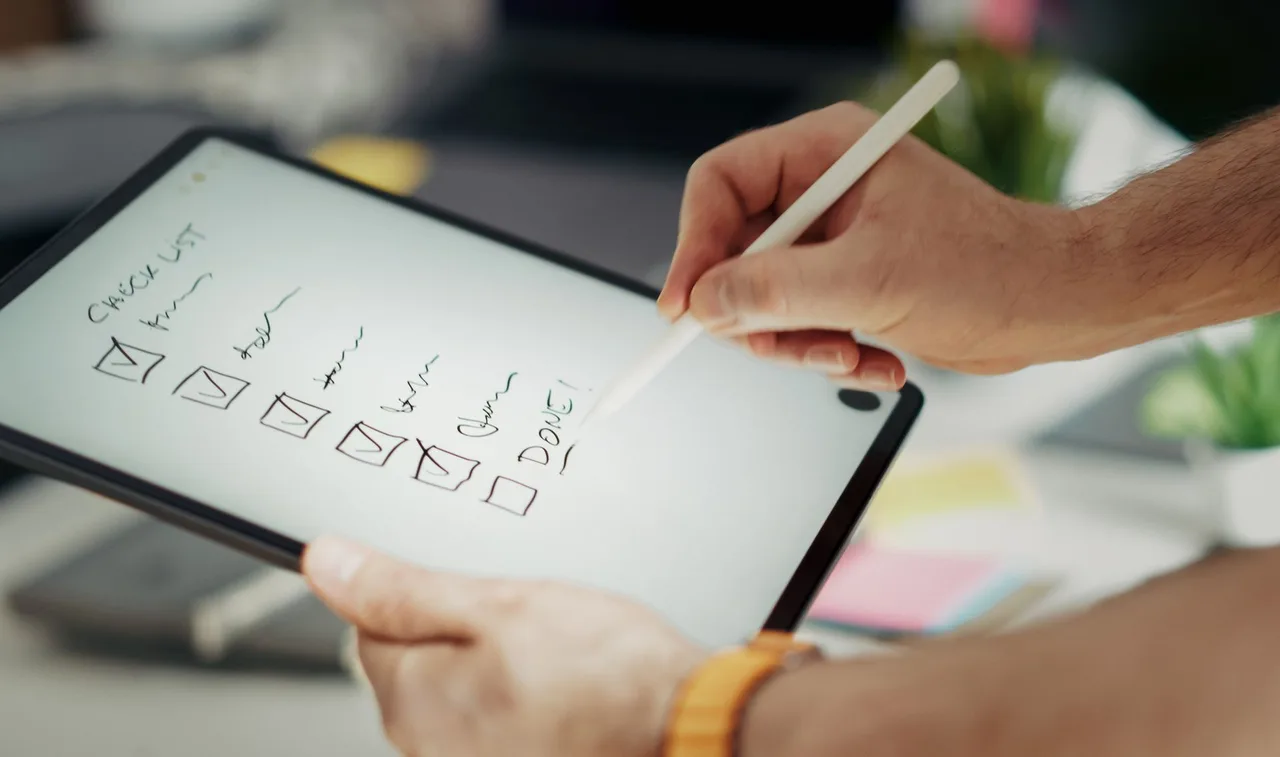 Property visit checklist displayed on a tablet
